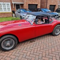 MGA 1600 Roadster import usable classic in Rosso Red.